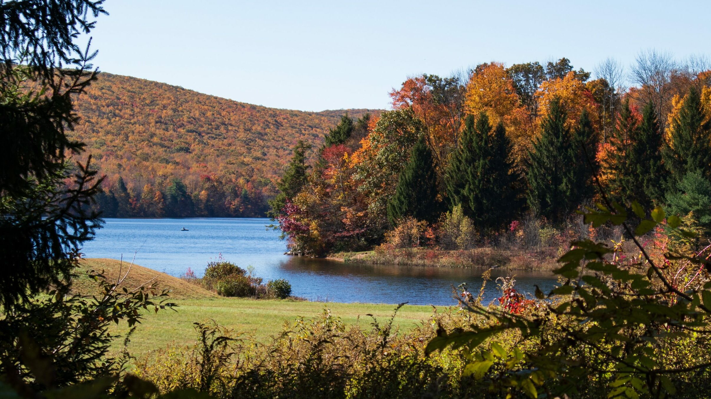 A lake with fall trees.